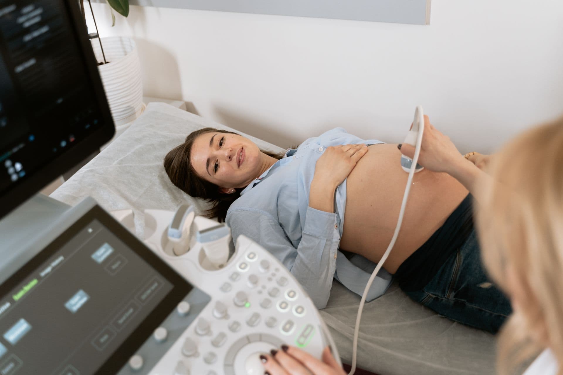 A pregnant woman receives an ultrasound